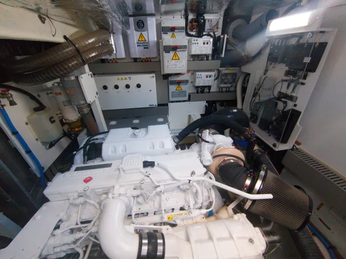  Yacht Photos Pics Engine room of 2022 Prestige 590 yacht, featuring advanced mechanical systems and components.