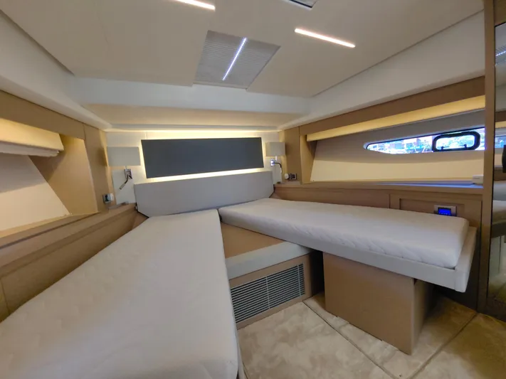  Yacht Photos Pics Luxurious interior of 2022 Prestige 590 yacht with modern design and comfortable seating.