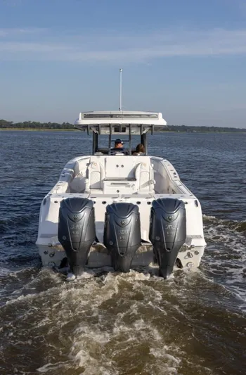 Black Label Marine Group Yacht Photos Pics 2025 Sea Fox 368 Commander Center Console boat with triple outboard engines on water.