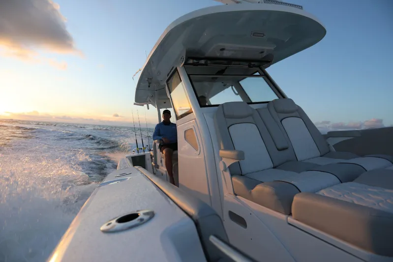Black Label Marine Group Yacht Photos Pics 2025 Sea Fox 368 Commander Center Console cruising at sunset.