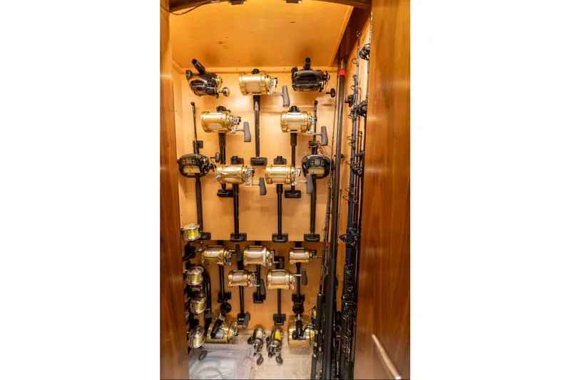 Trailer Trash Yacht Photos Pics Fishing rod storage in 2021 Viking 58 Convertible yacht, featuring multiple reels and rods.