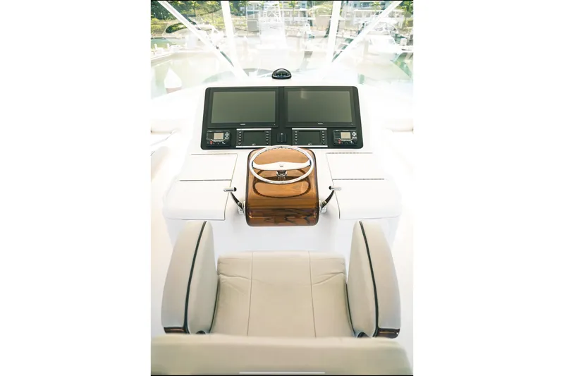Trailer Trash Yacht Photos Pics Viking 58c 2021 yacht helm with dual screens and leather seating.