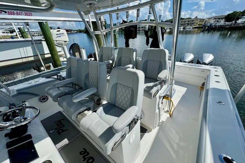 Trade In-- Bring All Offers & Trades Yacht Photos Pics 2021 SeaHunter 41 CTS boat interior with luxurious seating and modern design.