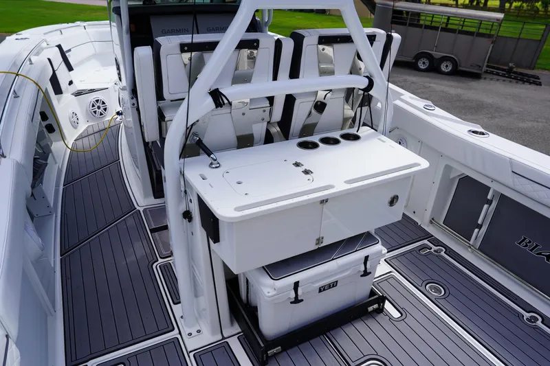  Yacht Photos Pics 2023 Blackfin 302 CC boat interior with seating, storage, and modern amenities.