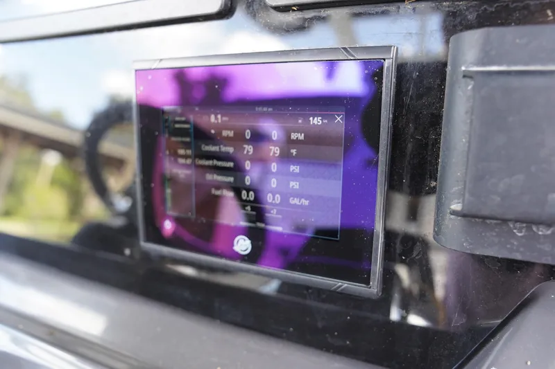  Yacht Photos Pics 2023 Blackfin 302 CC dashboard display showing engine metrics and performance data.