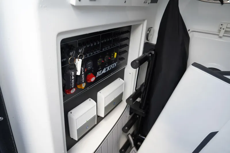  Yacht Photos Pics Control panel of 2023 Blackfin 302 CC boat with keys and switches.