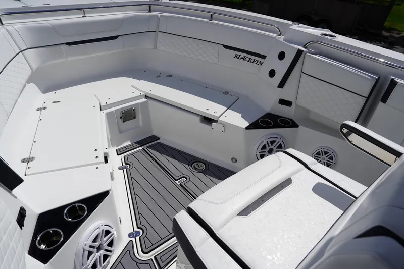  Yacht Photos Pics 2023 Blackfin 302 CC boat interior with sleek seating and modern design features.