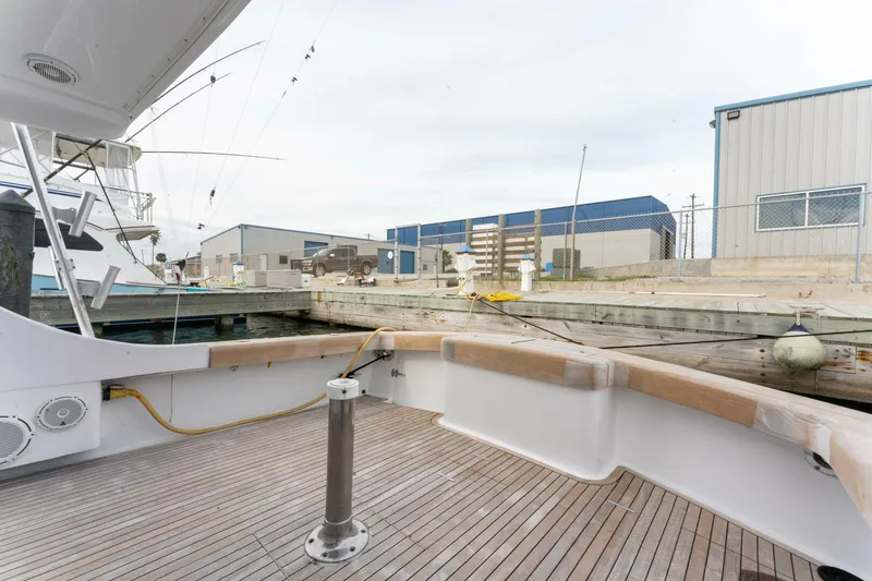 Natural Yacht Photos Pics 1984 Custom Carolina 41 Ricky Scarborough boat docked at a marina.