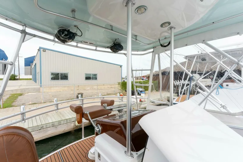 Natural Yacht Photos Pics 1984 Custom Carolina 41 Ricky Scarborough boat interior with dockside view.