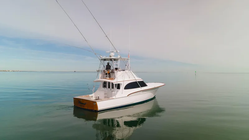 Natural Yacht Photos Pics 1984 Custom Carolina 41 Ricky Scarborough boat cruising on calm waters.