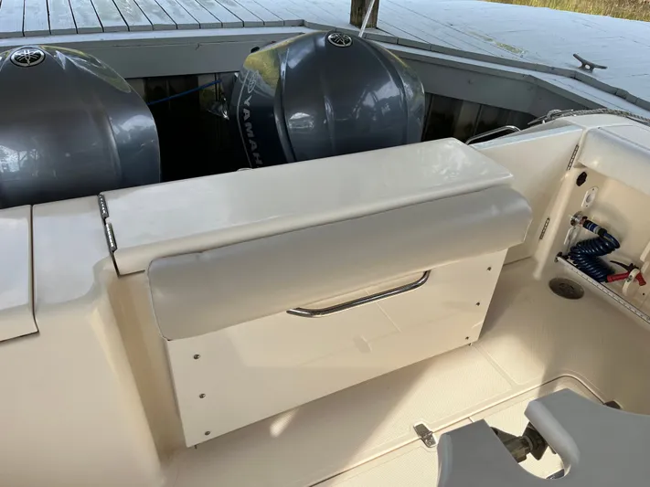  Yacht Photos Pics 2010 Pursuit OS 345 Offshore boat with Yamaha engines and cushioned seating.