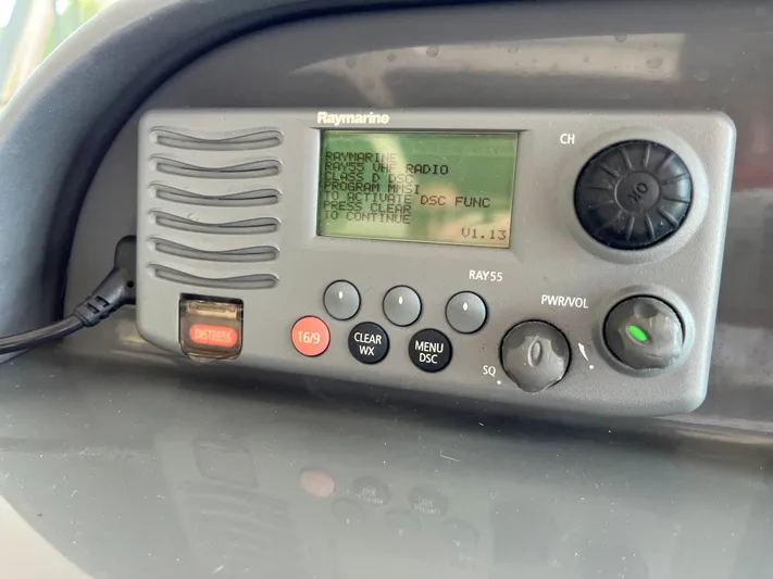  Yacht Photos Pics Raymarine RAY55 VHF radio on 2010 Pursuit OS 345 Offshore boat dashboard.