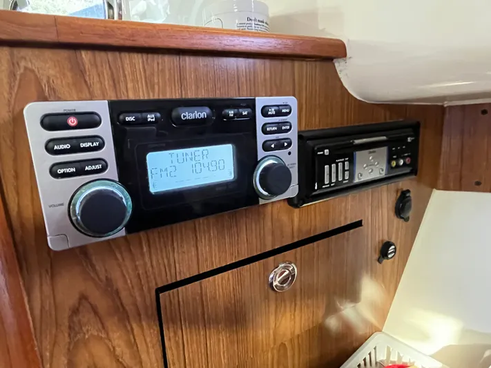  Yacht Photos Pics Clarion audio system in 2010 Pursuit OS 345 Offshore boat interior.