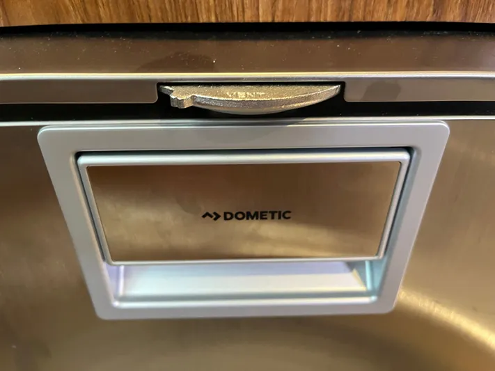  Yacht Photos Pics Dometic appliance on 2010 Pursuit OS 345 Offshore boat, featuring a sleek metallic design.