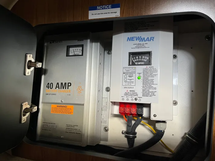  Yacht Photos Pics Electrical panel with 40 AMP battery charger in 2010 Pursuit OS 345 Offshore boat.