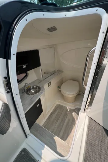 4th Quarter Yacht Photos Pics 2016 Formula 310 Bowrider interior bathroom with sink and toilet.