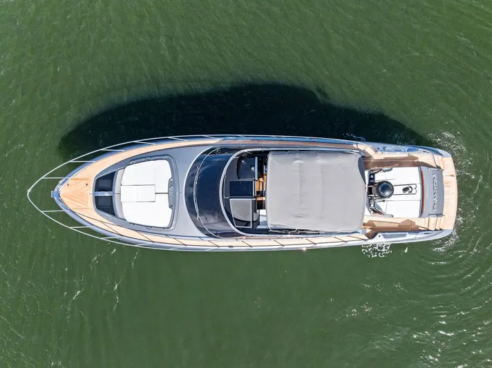 Phantom Yacht Photos Pics Aerial view of 2019 Riva 56 Rivale yacht on calm water.