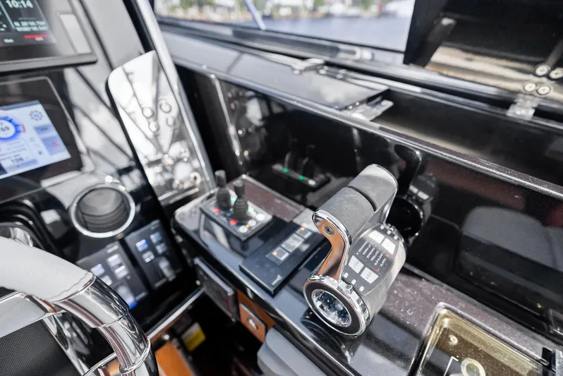Phantom Yacht Photos Pics Control panel of 2019 Riva 56 Rivale yacht with modern navigation equipment.