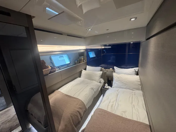  Yacht Photos Pics Luxurious cabin interior of 2018 Sanlorenzo SX88 yacht with twin beds and modern design.
