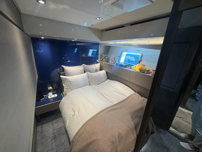  Yacht Photos Pics Luxurious bedroom interior of 2018 Sanlorenzo SX88 yacht with modern design and cozy bedding.