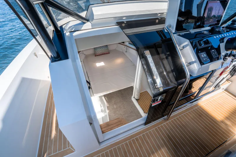  Yacht Photos Pics 2025 De Antonio Yachts D32 OPEN cabin interior with modern design and wooden flooring.