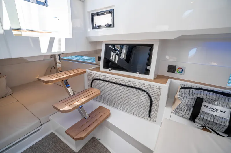  Yacht Photos Pics Interior of 2025 De Antonio Yachts D32 OPEN, featuring modern design and wooden steps.