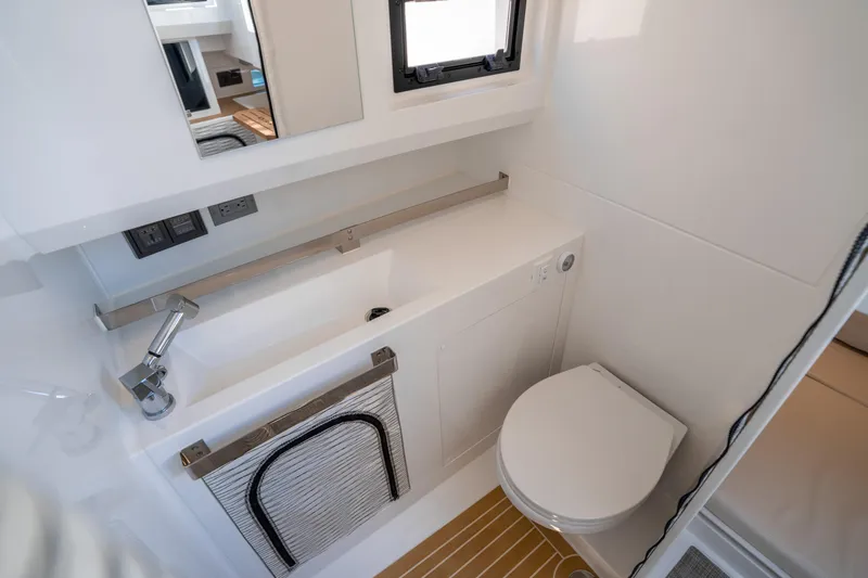  Yacht Photos Pics Modern bathroom interior of 2025 De Antonio Yachts D32 OPEN, featuring sleek design and compact amenities.