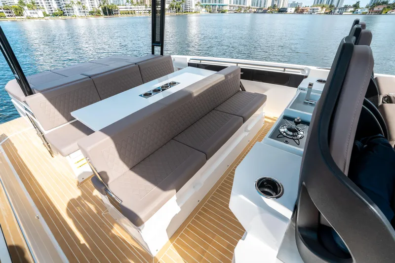  Yacht Photos Pics Luxurious 2025 De Antonio Yachts D32 OPEN with spacious seating and elegant design on the water.
