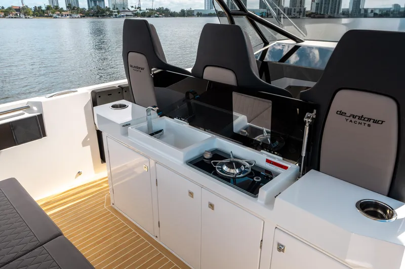  Yacht Photos Pics 2025 De Antonio Yachts D32 OPEN interior with sleek seating and modern amenities.