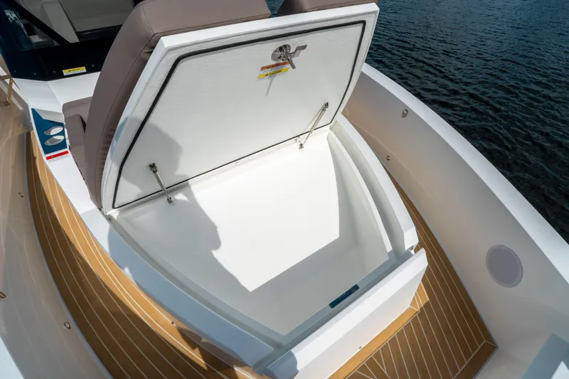  Yacht Photos Pics 2025 De Antonio Yachts D32 OPEN storage compartment with open lid, showcasing spacious interior.