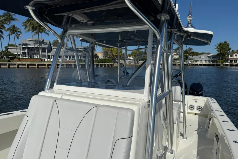  Yacht Photos Pics 2018 SeaVee 390Z boat on water, featuring sleek design and modern architecture.