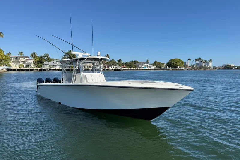  Yacht Photos Pics 2018 SeaVee 390Z boat on calm water with clear blue sky.