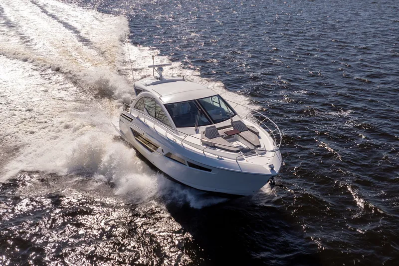  Yacht Photos Pics 2020 Cruisers Yachts 50 Cantius cruising swiftly on the water.