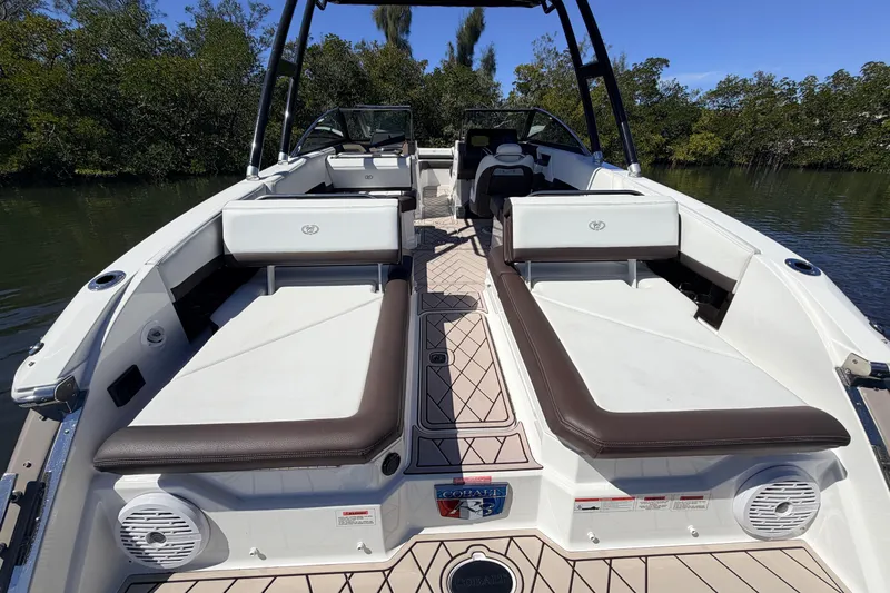  Yacht Photos Pics 2022 Cobalt R8 Outboard boat interior with seating and sleek design.