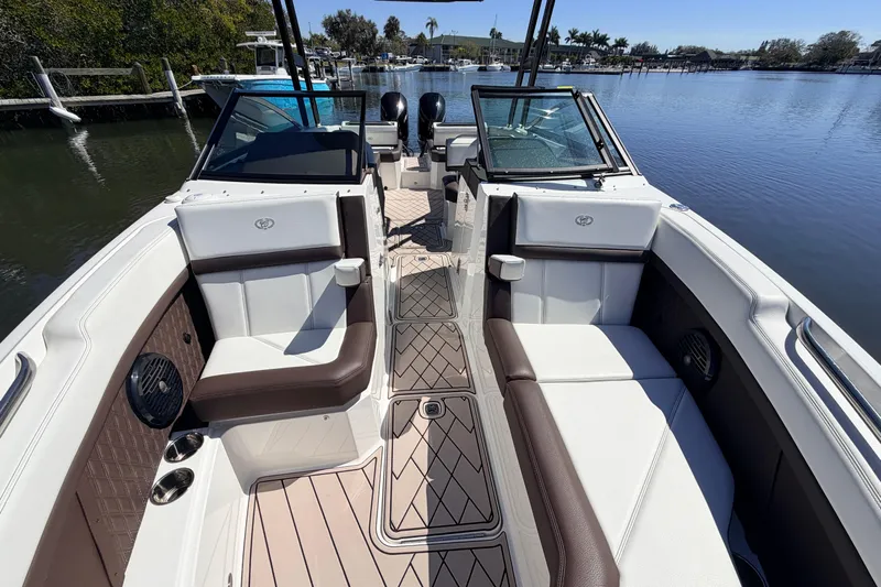  Yacht Photos Pics 2022 Cobalt R8 Outboard boat interior with luxurious seating and scenic water view.