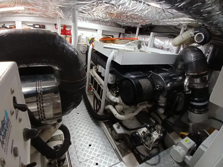 Palmar Yacht Photos Pics Engine room of 2023 Princess F55 yacht, showcasing advanced machinery and equipment.