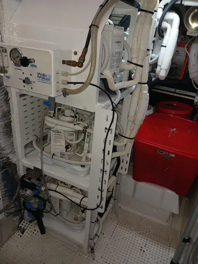 Palmar Yacht Photos Pics Engine room of 2023 Princess F55 yacht with complex piping and machinery.