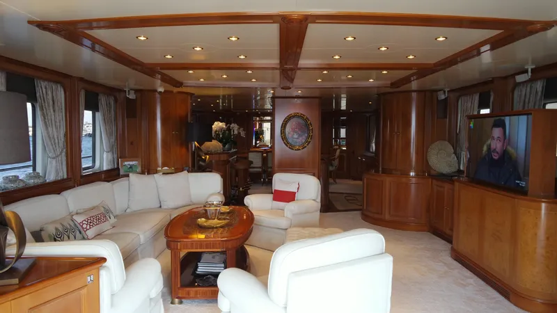 Bdt Yacht Photos Pics Luxurious interior of 2003 Benetti Classic 115 yacht with elegant furnishings and wood accents.