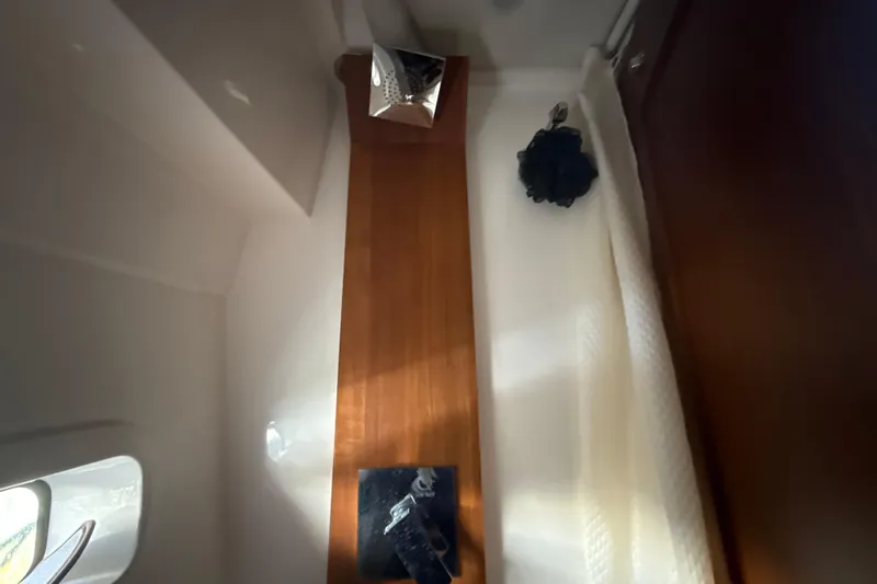  Yacht Photos Pics Interior of 2023 Regal 38 FXO yacht with wooden surfaces and modern decor.