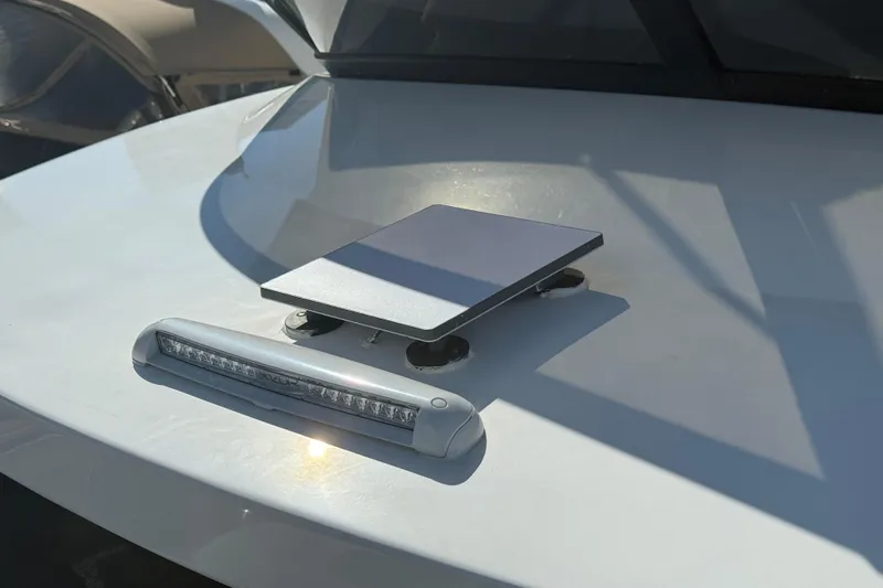  Yacht Photos Pics 2023 Regal 38 FXO boat with mounted solar panel and LED light.