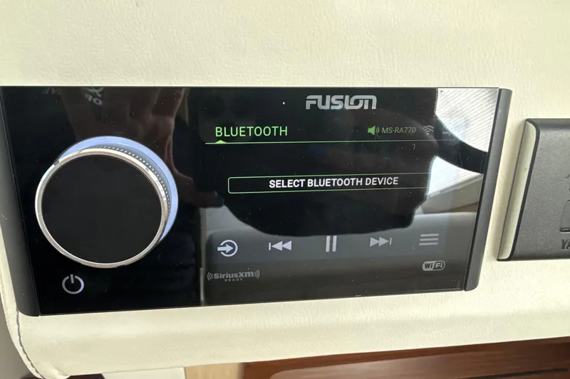  Yacht Photos Pics Fusion Bluetooth audio system on 2023 Regal 38 FXO boat dashboard.