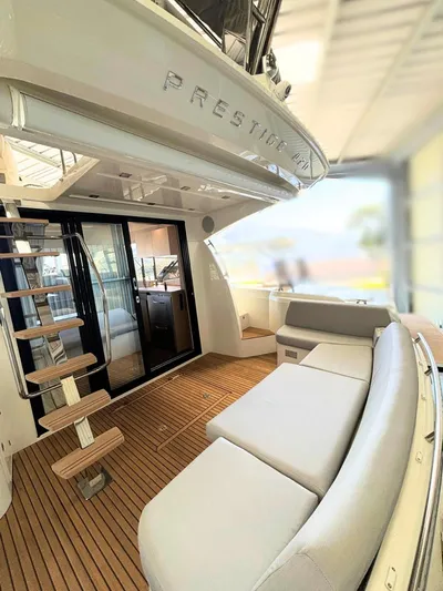 420 Fly Yacht Photos Pics 2024 Prestige 420 Fly yacht with elegant interior and spacious deck seating.