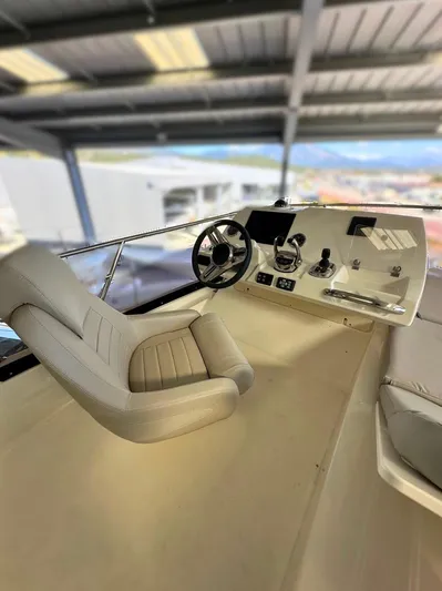 420 Fly Yacht Photos Pics 2024 Prestige 420 Fly yacht helm with modern controls and comfortable seating.