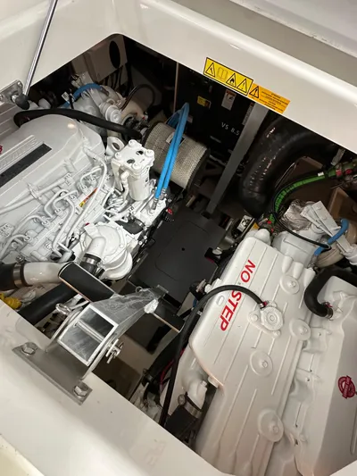 420 Fly Yacht Photos Pics Engine room of 2024 Prestige 420 Fly yacht, showcasing dual engines and mechanical components.