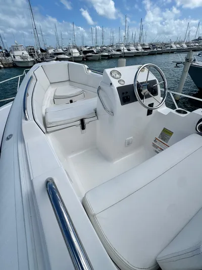  Yacht Photos Pics 2011 Hatteras GT60 yacht with sleek white interior, docked at marina.