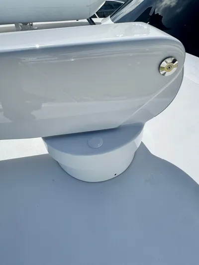  Yacht Photos Pics Close-up of a 2011 Hatteras GT60 yacht component, featuring sleek white design.