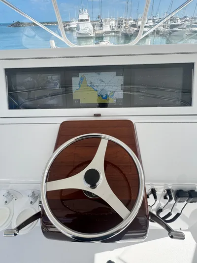  Yacht Photos Pics Helm of 2011 Hatteras GT60 yacht with navigation display, docked at marina.