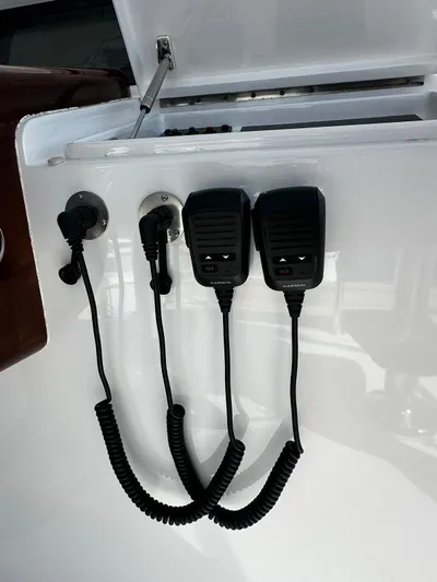  Yacht Photos Pics 2011 Hatteras GT60 boat communication equipment with two black handheld radios.