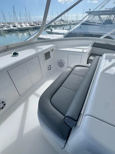  Yacht Photos Pics 2011 Hatteras GT60 yacht interior with sleek seating, docked at marina.