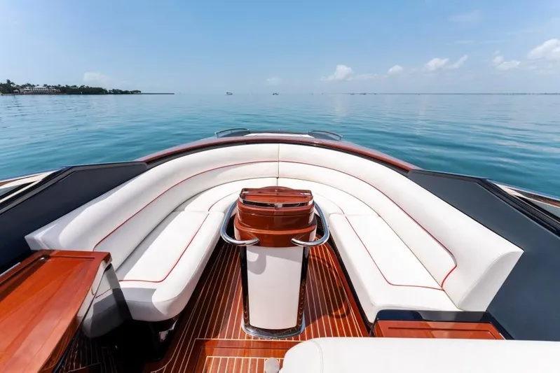 Our Trade Yacht Photos Pics Luxurious 2020 Riva Aquariva Super yacht interior with white seating and wooden accents.